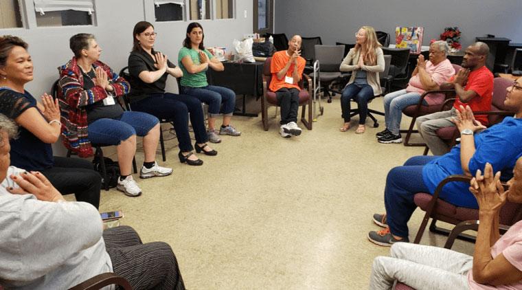 Engaging with Aging participants sitting in a circle